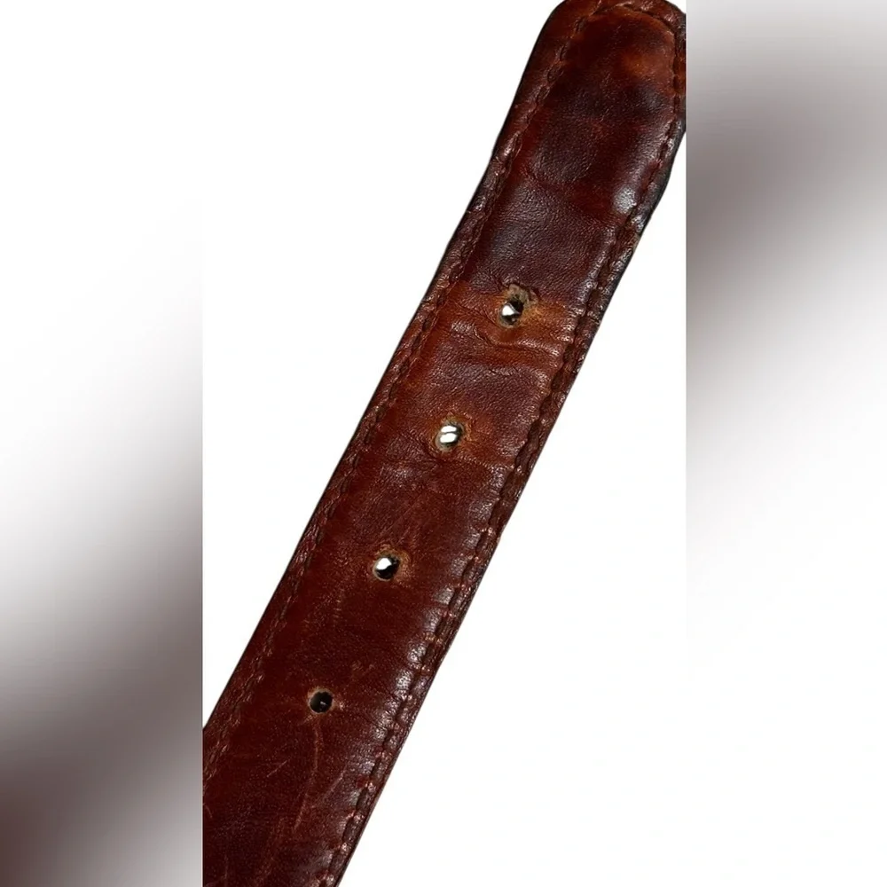 A men’s / women’s leather braided belt, Made in Uraguay. M.